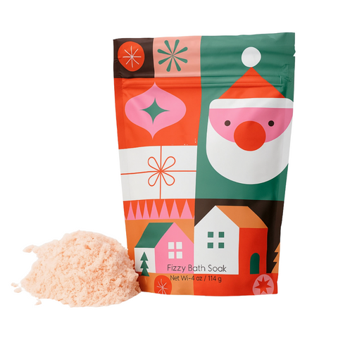 Fizzy bath soak packaging with colorful design and pink powder 