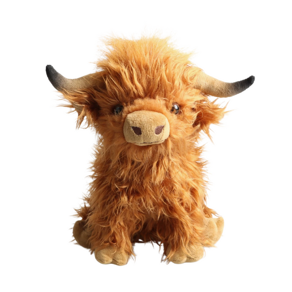 Plush toy of a brown highland cow